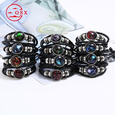 China Vintage Oushixuan brand Punk Handmade Multi Layer Braided Cow 12 Zodiac Charm Glow In The Dark Leather Bracelet for sale