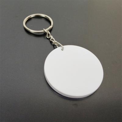 China DYE Sublimation Heat Press Round Shape Factory Price Blank Sublimation Key Chain Polymer Plastic Key Chain for sale