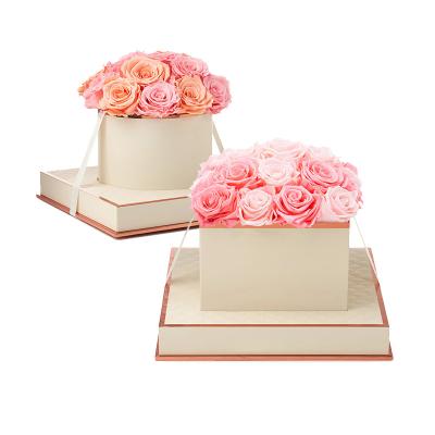 China Luxury Handmade Custom Paper Gift Wrapping Rose Flower Box With Lid Round Logo Wedding Gift White Printing Paper Cardboard for sale