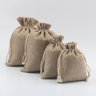 China 100% eco-friendly jute mini bags wholesale, jute drawstring bag, small jute pouch bag for sale