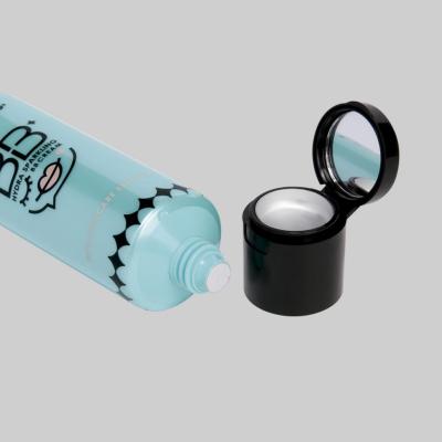 China La crema vacía plástica cosmética de encargo del tubo 30-80ml se ruboriza plástico del protector labial compone el tubo de la combinación con el espejo en venta