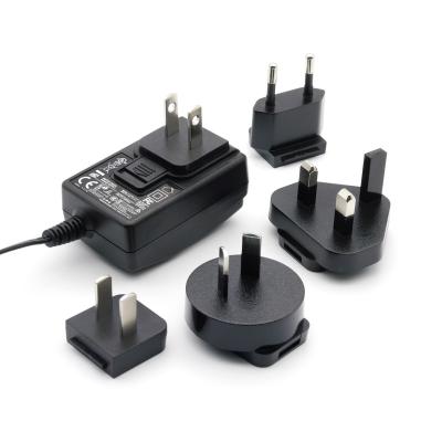 China DOE Power Adapter AC/DC 12V 0.5A 1A 1.25A 1.5A 2A 2.5A 3A Pin Interchangeable FCC RCM PSE CCC BSMI BSMI for sale