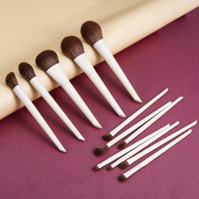 China Angular Blush Gracedo White Wooden Handle 12Pcs Professional Oval Eye Makeup Brush Set For Beauty for sale