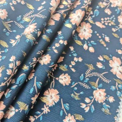 China Antistatic Recycle Polyester RPET Gold Foil Crepe Printed Fabric For Dress Garment for sale