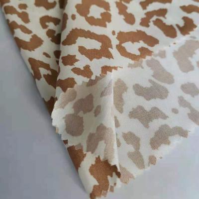 China 60%cupro metallic high quality fiber 40% viscose 120D*120D sand wash Cupro viscous twill printed fabric for fashion clothes for sale