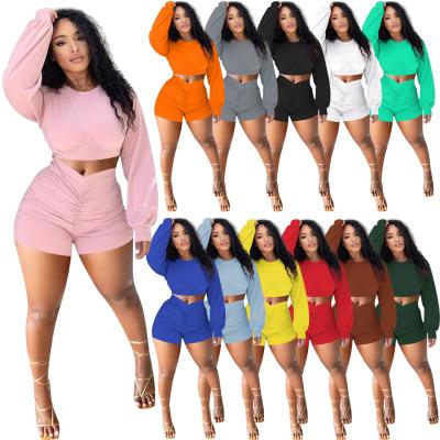 China 2021 Winter QUICK DRY Women New Long Sleeve Crop Tops Solid Pleated Biker Shorts Sets Customized Logo Two Piece Matching Sets for sale