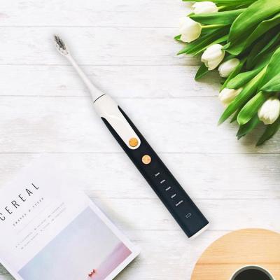 China Twice Per Day OEM Black Adult Electric Toothbrush 360 Automatic Toothbrush for sale