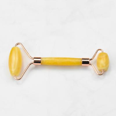 China New Design Jade Face Roller Natural Yellow Jade Facial Roller Whitening for sale