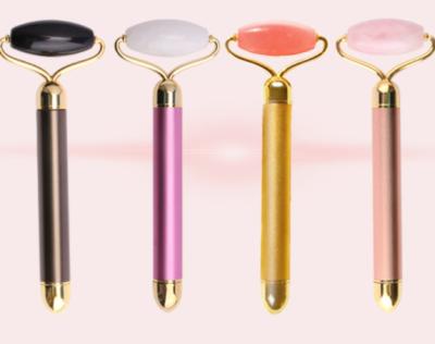 China Electric vibration facial roller whitening rose quartz vibration face roller massage roller for sale