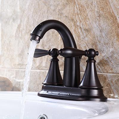 China Modern Filigree Brass Metered Basin Faucet CUPC Black Brass Taps for sale