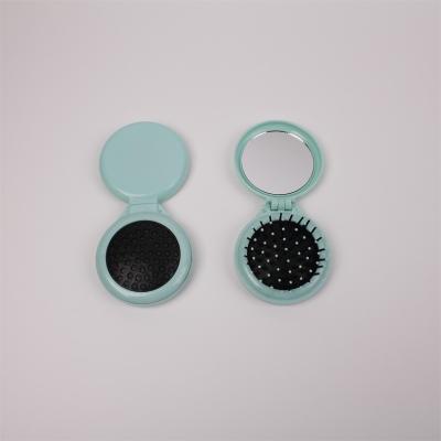 China Fashional Hair Comb Hair Styling Tools Comb Round Mini Folding Comb Air Mirror Brush Girls Portable Bag Massager for sale