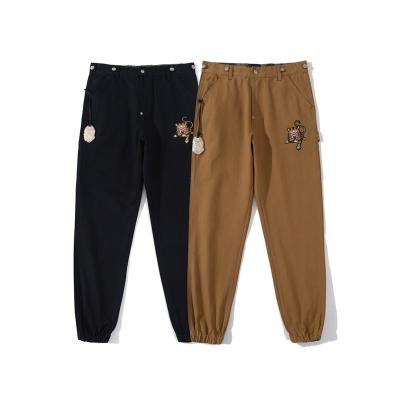 China 2020 Factory Price BAPE Shark Men's Tiger Head Gold Bottle Opener Embroidery Anti-pilling Long Pants With Asian Size for sale