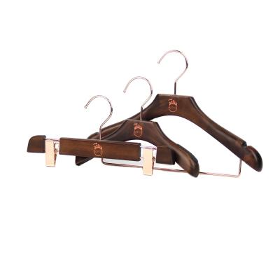 China Durable Modest Luxury Baby Brand Wooden Clothes Hanger for sale