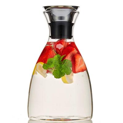 China Viable Heat Resistant Flower Tea Carafe Metal Heat Resistant Glass Cover Automatically Opens for sale