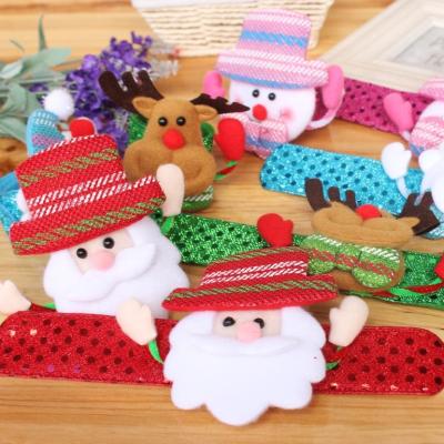 China Christmas Gift Wholesale Christmas Kids Play Plush Slap Band Led Detachable Slap Bracelet Wristband for sale