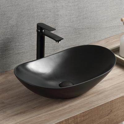 China Modern Best Selling Classic Design Ingots Shaped Hand Wash Sink Matte Black Ceramic for sale