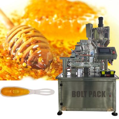 China Food Dession Semi-automatic Three Honey Spoon Sealing Machine for sale