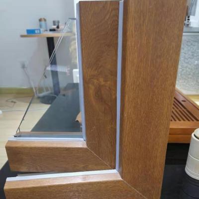 China Double Screen Pane Style Wooden Color PVC Casement Folding French Window With Insulated Glass For Home Windows for sale