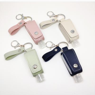 China Leather Case Holder Hygiene Sanitizer Hand Case Key Chain Lip Gloss Lip Sanitizer Container Key Chain for sale