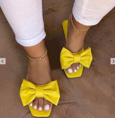 China 2020 Summer H312 Massage Girls Women Yellow Flat Sole Slides Slippers Female Bowknot Slides Bare PU Beach Slippers for sale