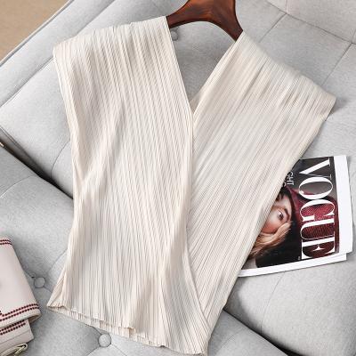 China Anti-wrinkle Miyake pleated design sense niche v-collar T-shirt 2021 summer new fashion short sleeve women soft style shirt small for sale