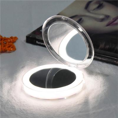 China Lighted Cosmetic Make Up Led Pocket Mirror Wholesale Small Fold Led Mirror for sale