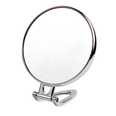 China Large Double Sided Metal Frame Enlarged Double Sided Folding Makeup Mirror With Handle for sale