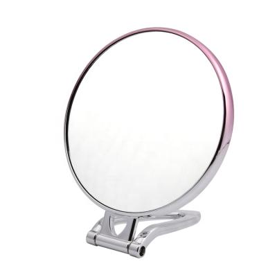 China Customized Color Metal Double Sided Foldable Double Sided Hand Mirror Make Up Mirror for sale