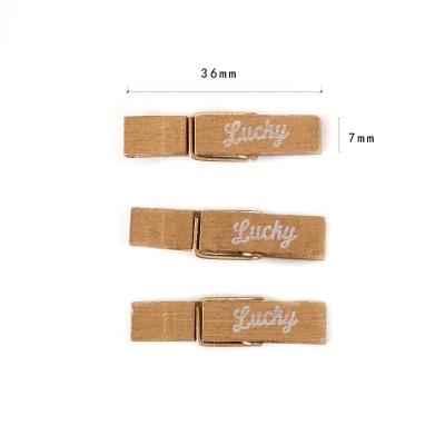 China Europe gold wood clip with letter logo for sale