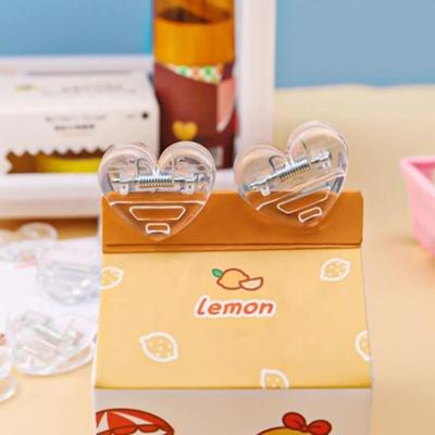 China Metal Heart Staples CIA Transparent Clip Ticket Paper Stationery Clip For Tags Bags Office Documents for sale