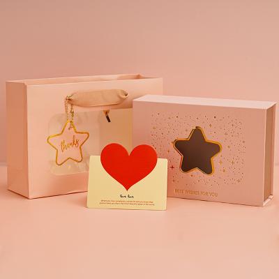 China Recyclable Free Design Custom Pink Logo Printed Magnetic Packaging Gift Box for sale