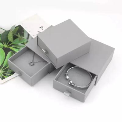 China Manufacturer Luxury Handmade Slide Box Logo Printed Gift Packaging Boxes With Ribbon For Jewelry for sale