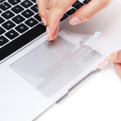 China Easy Remove KAKUDOS Transparent Touch Pad Peel Off Sticker Die Cut Invisible Protective Film For Macbook Series for sale