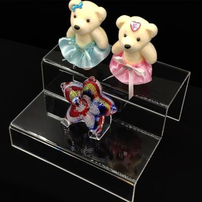 China Beautiful 2022 fashionable and beautiful customizable fashion ladder transparent acrylic desktop display stand for sale