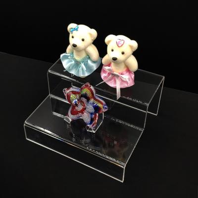 China Fashionable and beautiful acrylic exclusive custom two-layer transparent tide brand toy display stand for sale