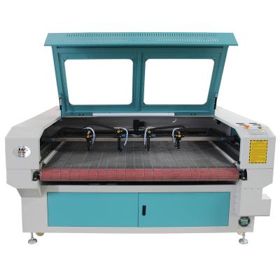 China Laser CUTTING MC1610 Automobile Car Seat Covers Foot Mat CO2 Laser Feeding Leather Cutting Machine for sale