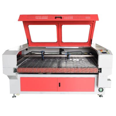 China Laser Cutter High Efficiency Two Head Laser Cutting Machine With Auto Feeding Function 1610 For Textile / Garments for sale