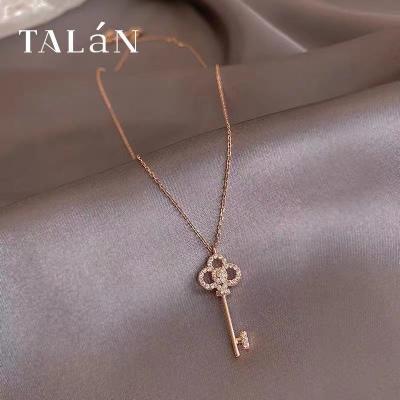 China 2021 Hot Selling Simplicity Ins Charm Necklace Cavity Petal Key Necklace For Girls for sale