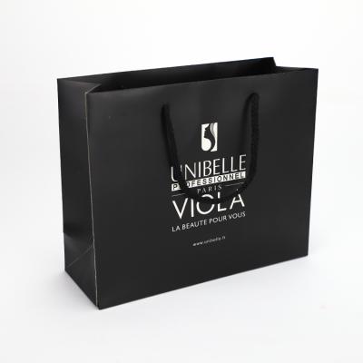 China Custom Recycled Paper Black Paper Bag Printing Recycled Shoes Packaging Gift Shopping Bag With Silver Stamping for sale