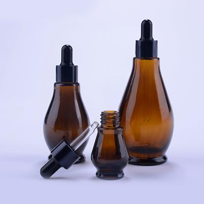 China Custom OEM Style Brown Essential Oil Packaging Empty Glass Bottles With Dropper Cap For Skin Care for sale