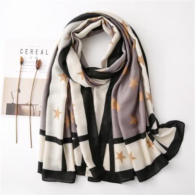 China Polyester Printed Warm Cotton And Canvas Feel Gauze Holiday Big Beach Towel Shawl Wild Soft Bowknot Five-pointed Love Star Scarf for sale