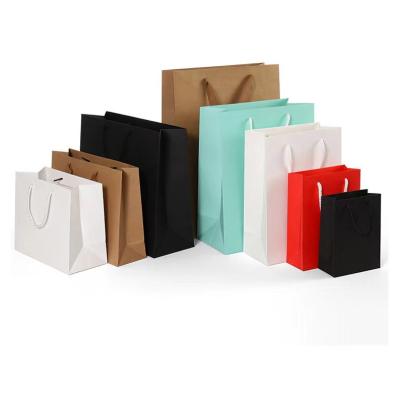 China Recyclable Multiple Functions Custom Logo Packaging Paper Supermarket Recyclable Shopping Paper Bag for sale