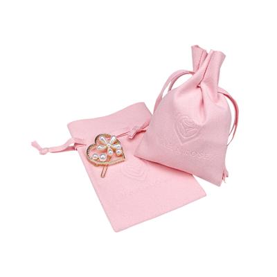 China Soft Pink Mini Suede Cord Suede Pouch Jewelry Packaging for Wedding Earring for sale