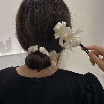 China Popular Ethnic Flower Hairpins For Braiding Artifact Hair Ball Women Headband Accessory Korean White Ponytail Head Hair Maker for sale