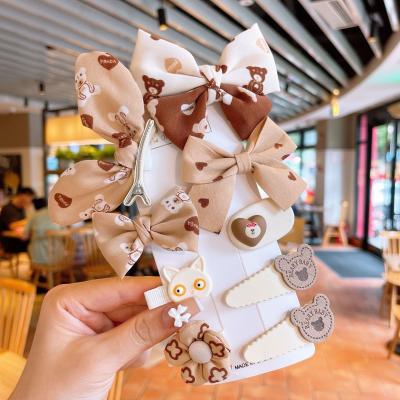 China New Cartoon Bear Bow Hairpins Soft Brown Winter Cloth Cute Hair Clip Hits Side Clip For Kids for sale