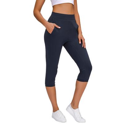 China Breathable Women's Workout Leggings With Front Pockets Yoga Pants With Elastic Band Performance Yoga Leggings For Woman for sale