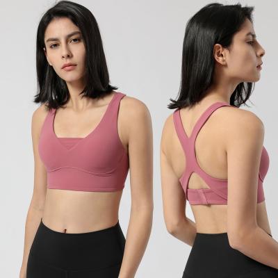 China YUCHI Women's Ultra Soft Breathable Gym Workout Top Buckle Up Racerback Sports High Impact Bra for sale