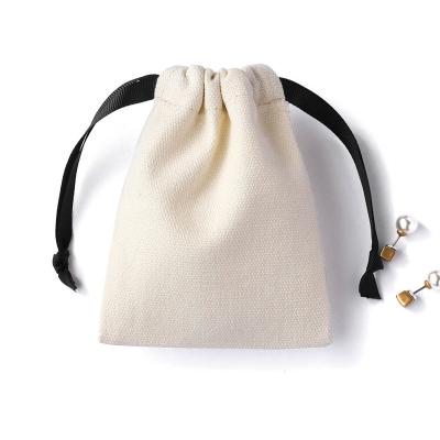 China Elelgent 8*10 cm Beige Cotton Canvas Drawstring Pouch Medium Gift Jewelry Packaging Bags for sale