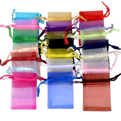 China Wholesale Elelgent 10*15cm Free Sample 24Colors Jewelry Packaging Drawstring Organza Bag Wedding Gift Bags Pouches for sale