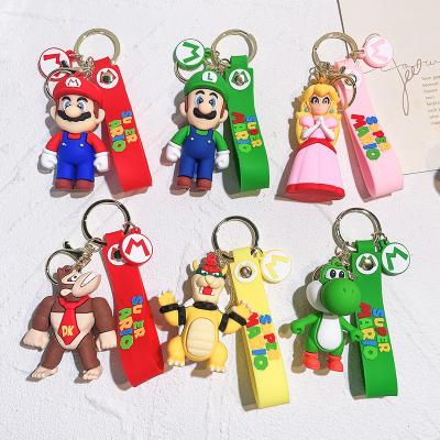 China Mario Keychain 3D Cartoon Mario Doll Backpack Decoration Car Key Keychains PVC Gift Dangling Soft Promotional Keychains for sale